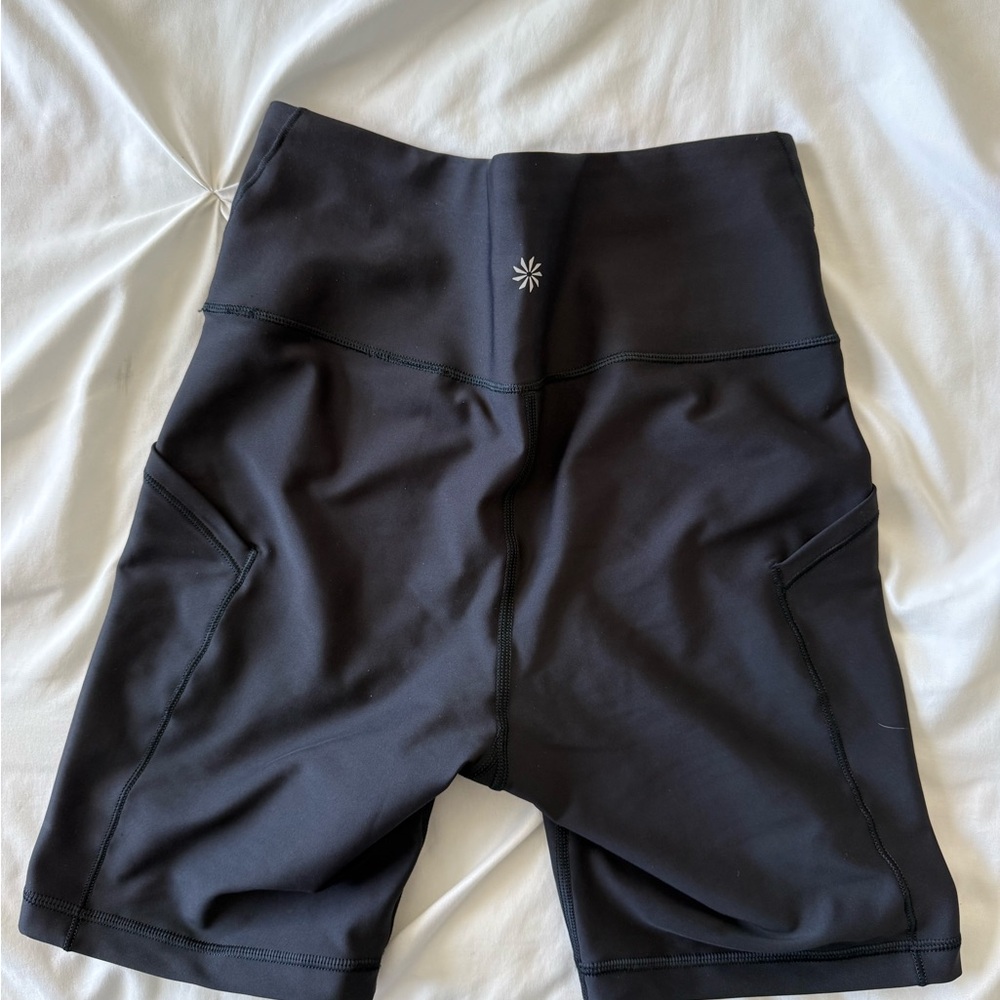 Athleta interval Stash High rise shorts 7”